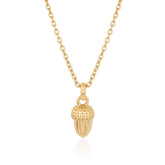 A rose gold necklace with a sterling silver acorn charm on an adjustable yellow gold chain.